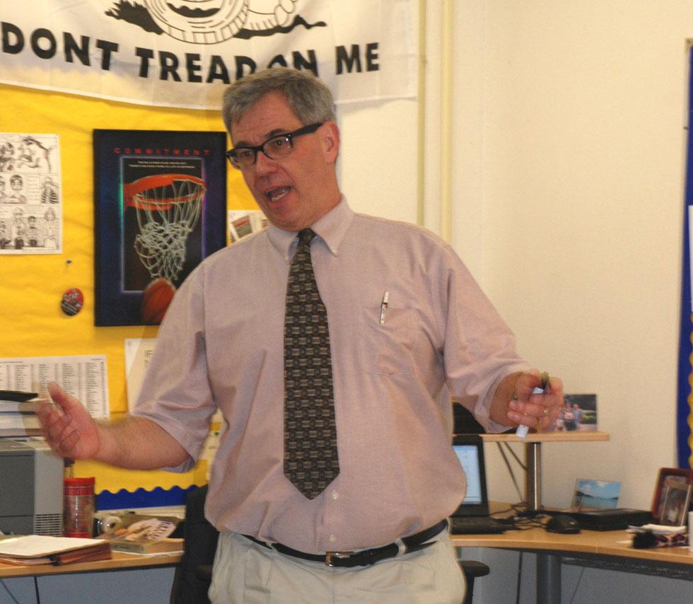 History teacher Sam Stewart is not satisfied with dormant students. 