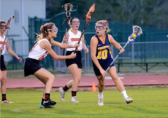 Senior captain Glinski-Boyd puts Winter Park High School in the spin cycle by spinning and weaving through their defensive pressure.