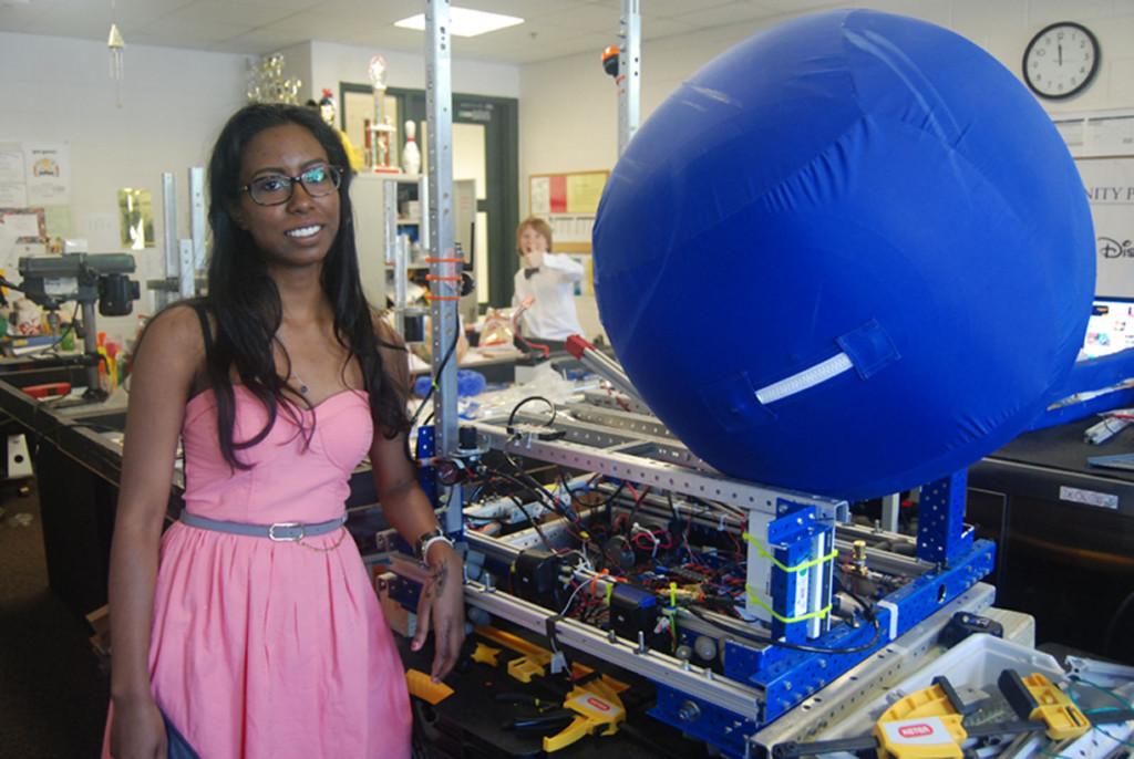 Jasmine Sinanan-Singh builds an impressive robot in a competition. She hopes to pursue a STEM career after college.