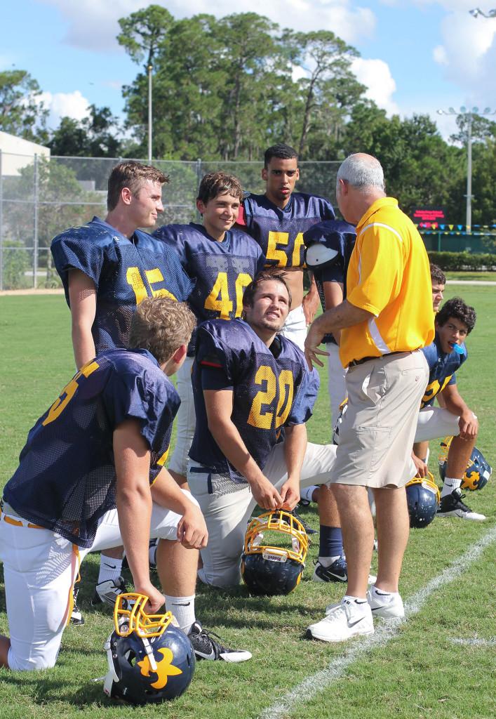 Bluth works to form relationships with the football team as well as other athletes.
