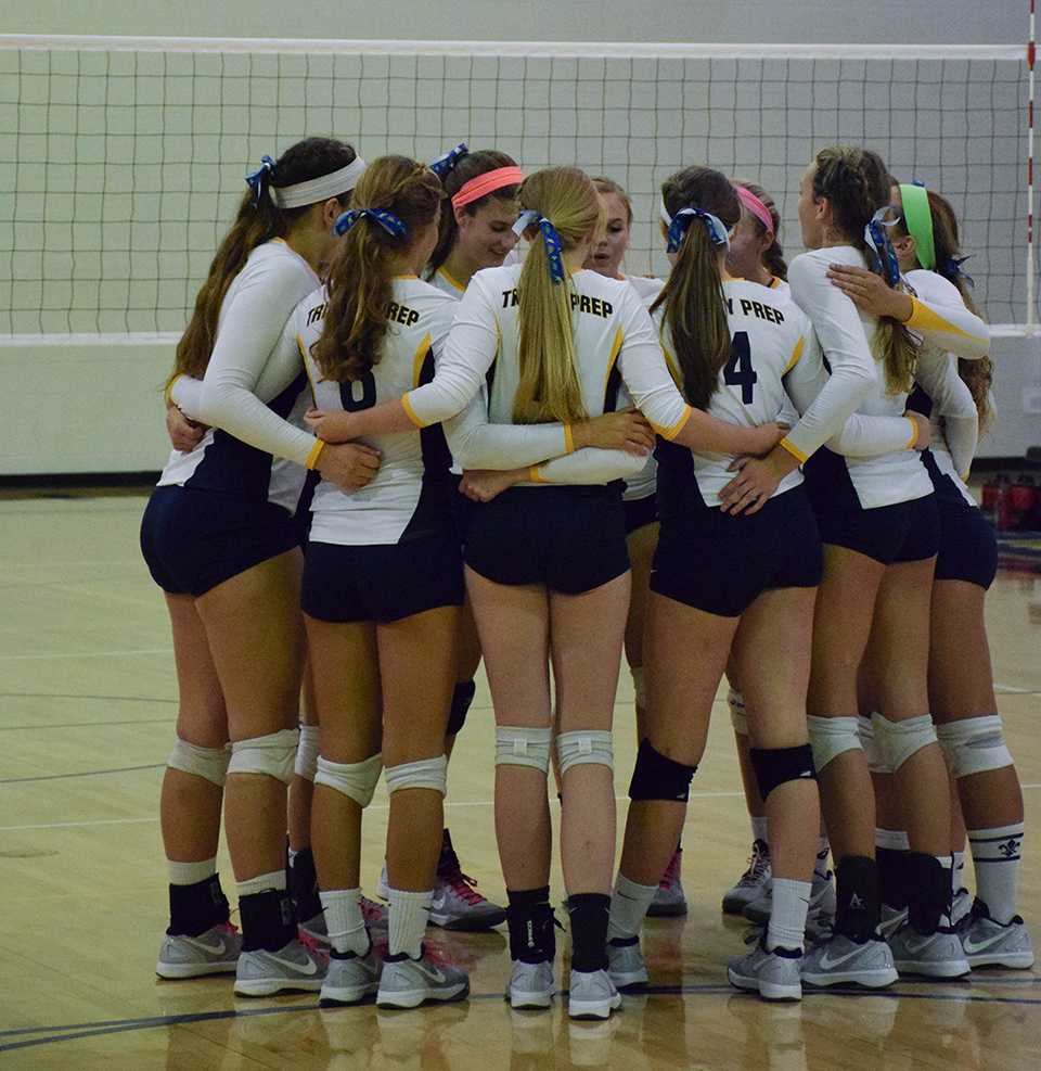 The+Saints+volleyball+team+faced+off+against+LHPS+in+their+district+tournament.