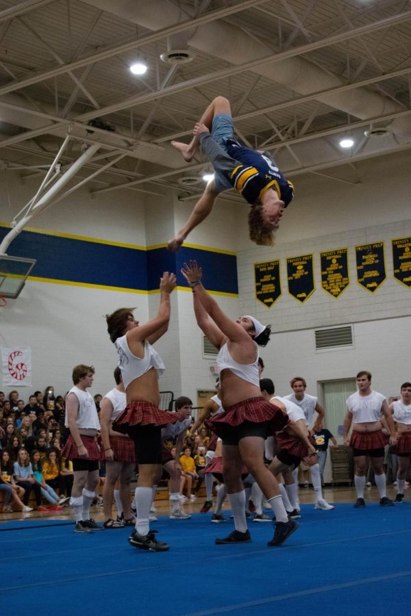 Senior Ike Evans 19 does a backflip with the help of Will Magargee 19 and Brett Lamoriello 19 as a part of the Senior Powderpuff dance. Upon sticking the landing, Evans was showered with cheers from the Senior class.