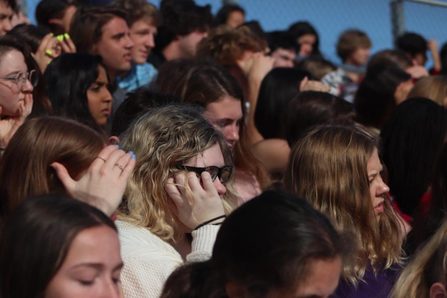 Trinity students look on with distress as they witness the destructive power that comes with a DUI car accident. 