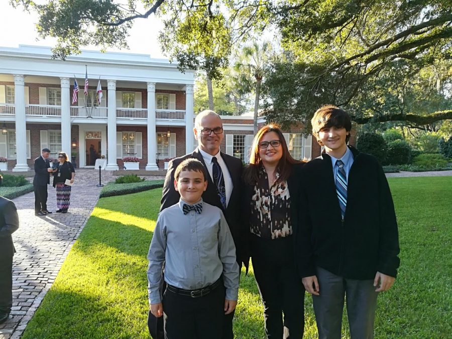 Dr. Jannotti (2nd from right) stands outside of Governors mansion with her family after being invited to an event by then-Florida Governor Rick Scott in 2018.
