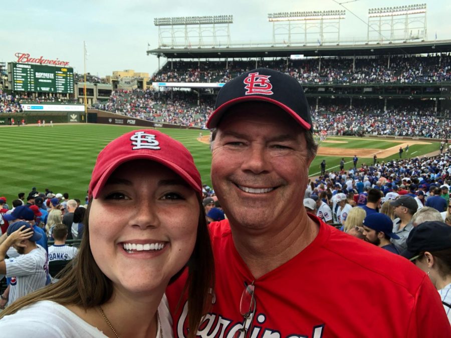 Ms.+Loudon+and+her+father+at+a+baseball+game.