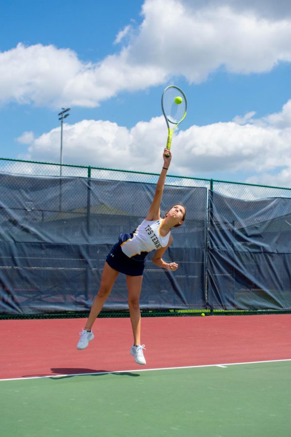 Eighth grader Carol Marques plays on the varsity courts. Seeded fourth in districts, Marques won one game and lost one game.