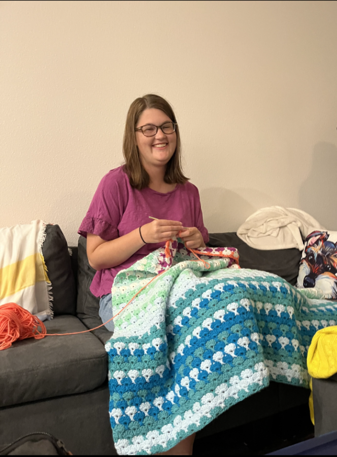 Julia Hren shown crocheting, one of her favorite hobbies. 