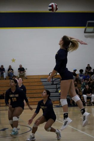 Sophomore outside hitter Elena Maynulet spikes the ball in a win against Orangewood on October 11.