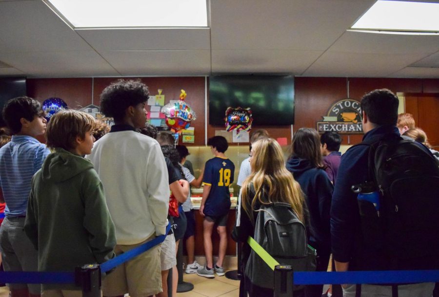 Due to confined spaces, the grille has sectioned off queues for the various food options. Students
rush with their backpacks to make it first in line.