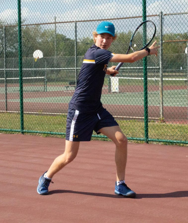 Freshman+Ben+Demetriades+works+on+his+forehand+at+a+practice.+Demetriades+also+trains+outside+of+school+by+himself+and+with+coaches.+Demetriades+is+8-0+so+far+this+season.