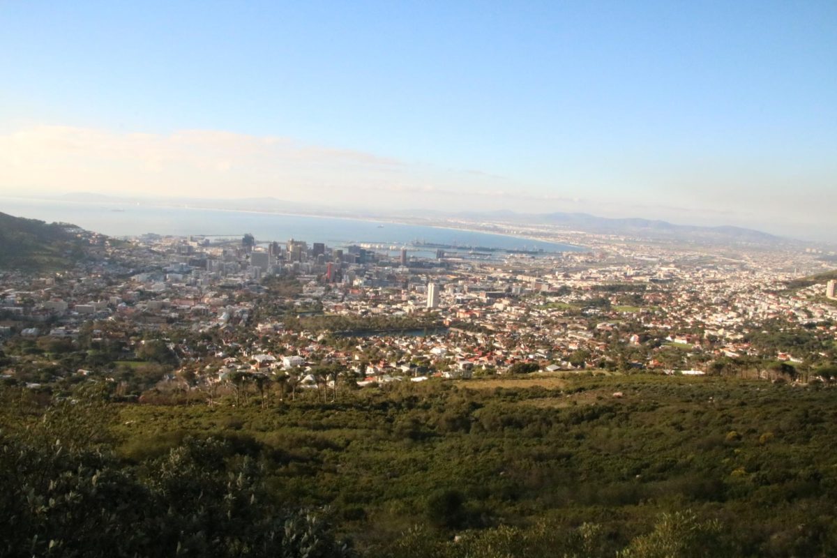 Students view from atop a hill overlooking Cape Town, South Africa. In 2019 three Trinity students traveled to there to kick off the start of an exchange program. Due to COVID, that program was put on hold, but it is now back on this summer. 