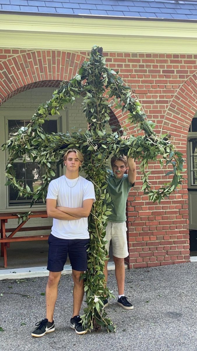 Frej Andersson-Oberg (left) poses with another ASSIST student next to a Swedish maypole they constructed for their last day of orientation in Boston. Photo courtesy of Frej Andersson-Oberg.