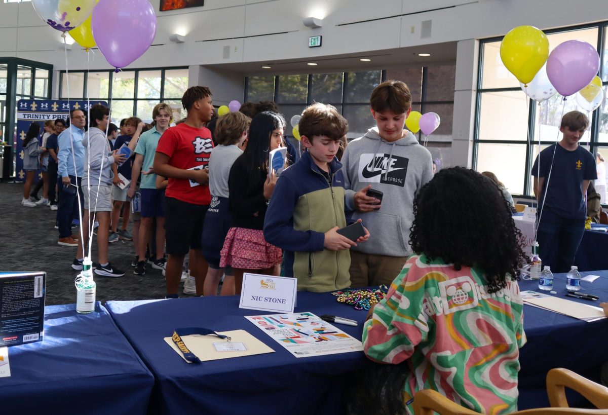 Students line up at the ninth annual Author Fest to have their books signed
by New York Times Bestselling author, Nic Stone. This annual campus event,
along with other traditions, has grown tremendously over many years.
