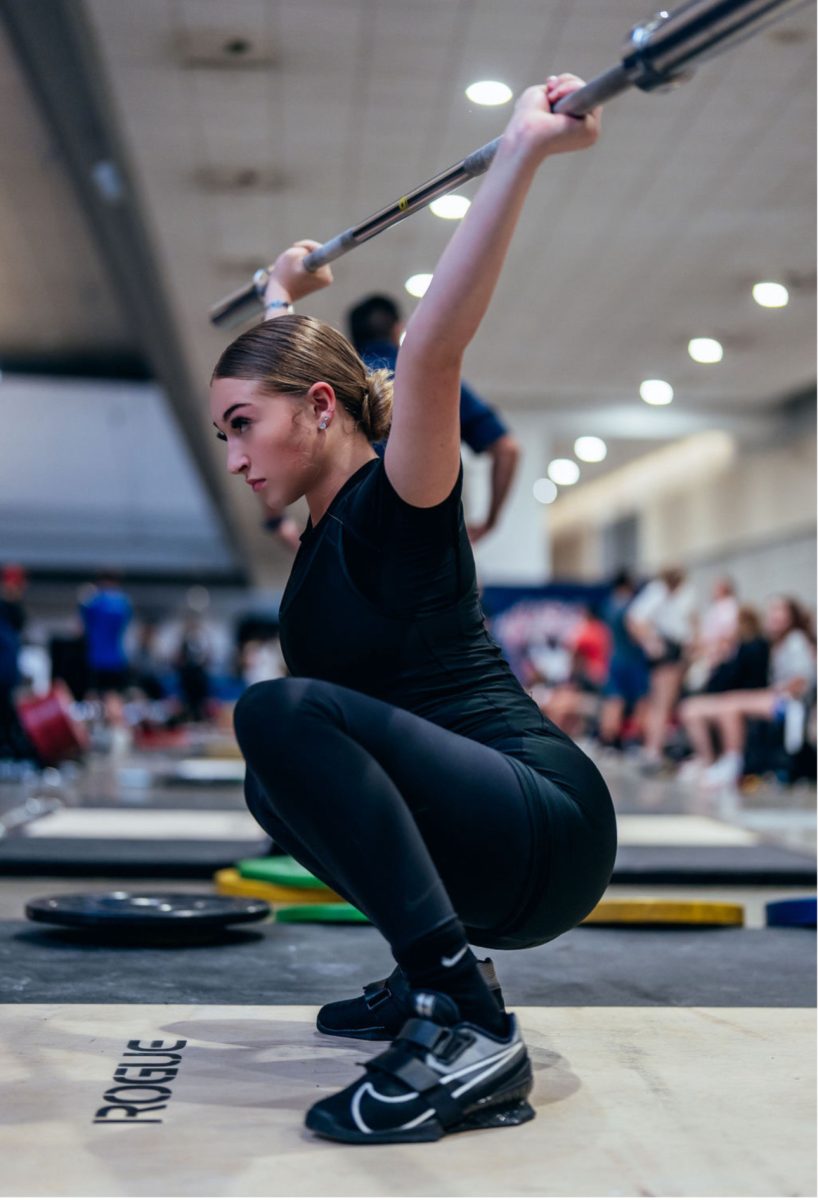 Junior Parker Tchekmeian warms up for her competition
at the 2024 USA Weightlifting National Competition