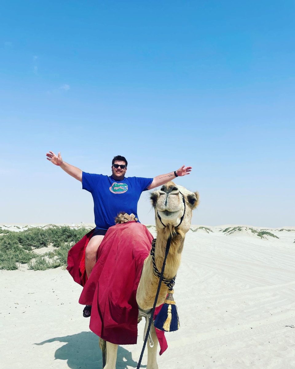 Lisko traversing the deserts of the United Arab Emirates by camel.