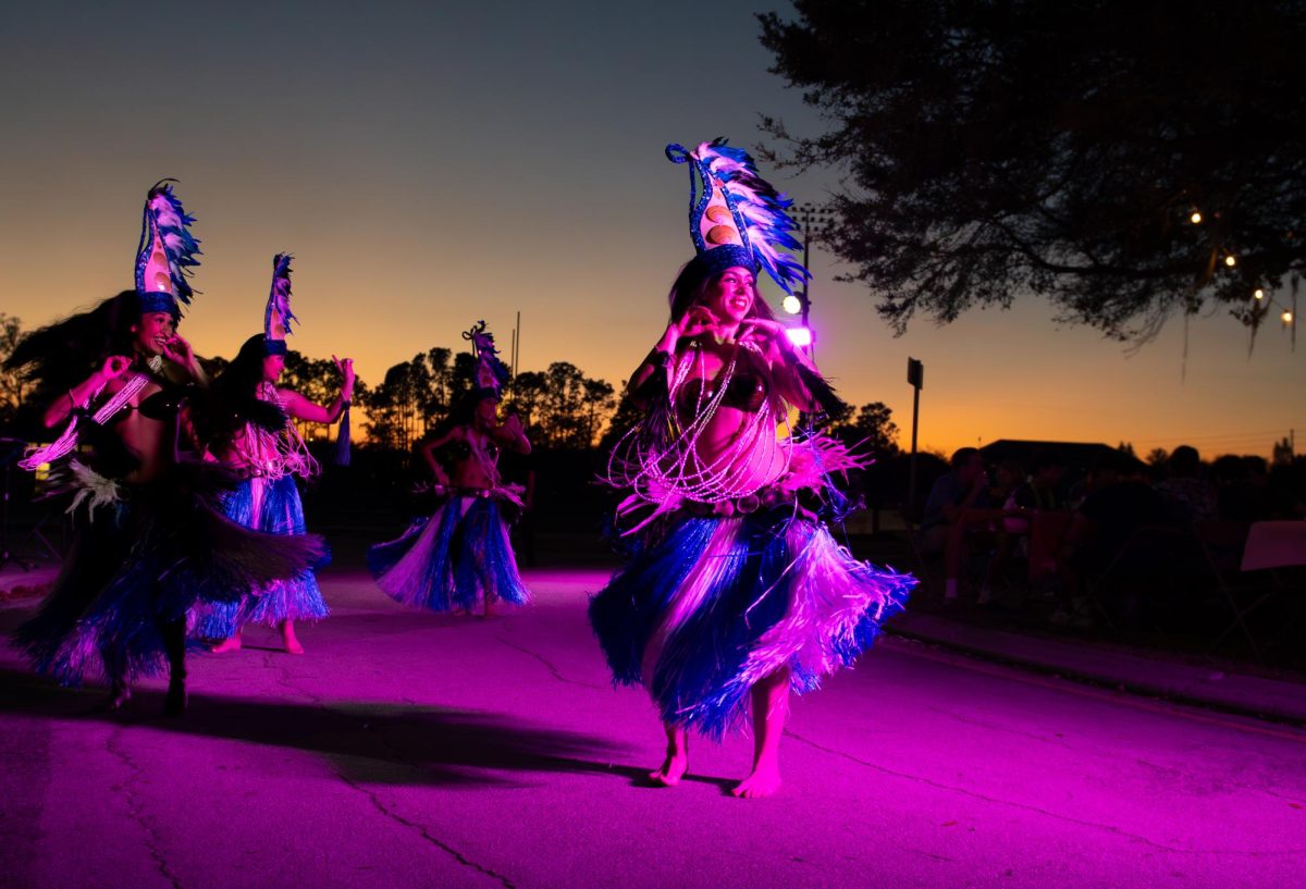 Dancers perform traditonal Polynesian dance at the Luau.