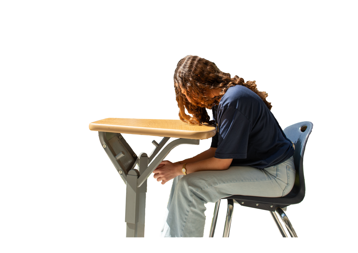 Charlotte Davis demonstrates the effects of slouching at the desk