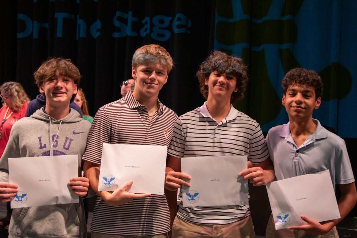 Freshman Brady Kohm, Jackson Martyny, Jacob Davis and Evad Makki awarded for their commitment for serving their community. 