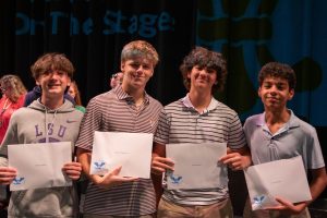 Freshman Brady Kohm, Jackson Martyny, Jacob Davis and Evad Makki awarded for their commitment for serving their community. 