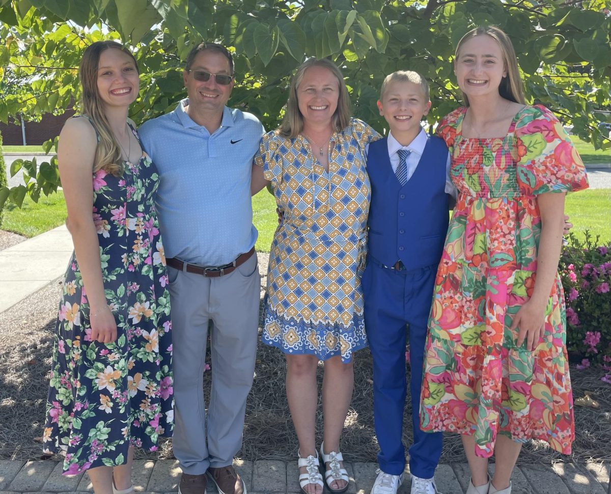 Jennifer Laible poses with her husband, two daughters, and son at a wedding.
Photo by Jennifer Laible, used with permission.