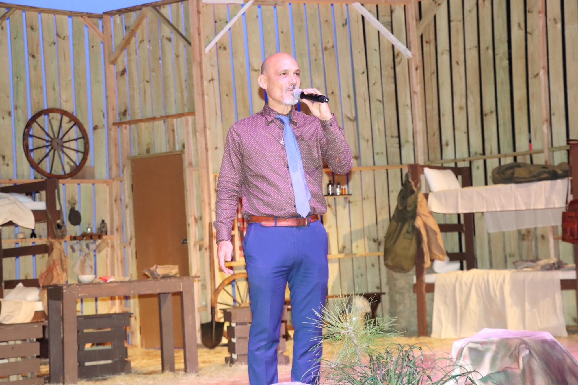 Acevedo speaks to the audience before the opening of his production. This is one of many shows he has directed, including “Grease,” “Oliver Twist,” “Death of a Salesman” and “The Crucible.”