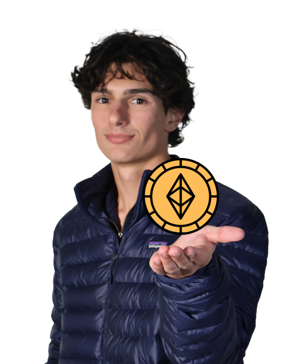 Senior Connor Brady holds an Ethereum coin, reflecting his involvement in and curiosity about cryptocurrency. 