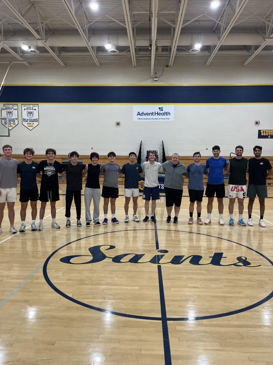 On Dec. 22, alumni played in the basketball alumni affinity
game with former coach and alumnus Eric Schneider.