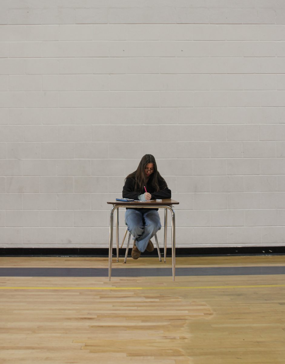 Liann Kurlansik ‘26 works quietly at a desk while completing her exam in the DAC, simulating the open testing environment.